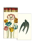 Box of matches with tulips and another with black bird