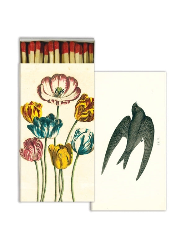 Box of matches with tulips and another with black bird