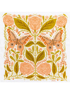 Tea towel with orange butterflies and floral pattern with green accents