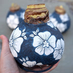 Hand painted Floral Jumbo Waxed Amaryllis Bulb from Peru will produce multiple stalks of red blooms.