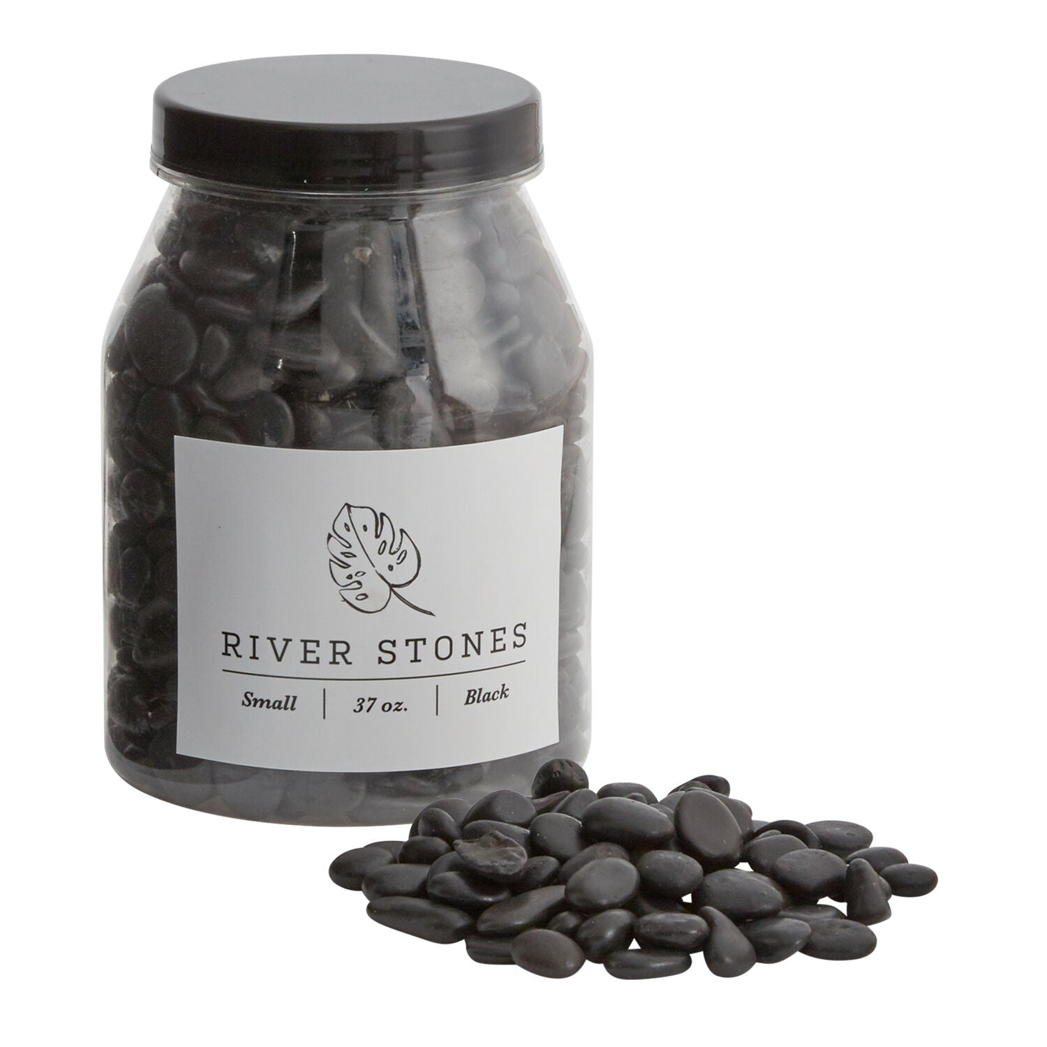 Jar of black river stones with a label on a white background