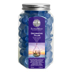 A 750ml clear plastic jar filled with blue decorative glass filler, featuring a purple label with the SuperMoss brand name and a silver metal lid.