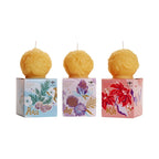 Sculpted beeswax candle ornaments by Big Dipper Wax Works include "joy", "peace", and "wish".