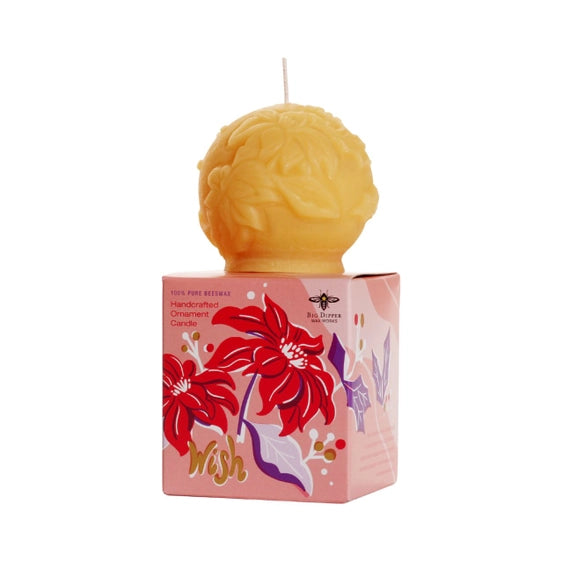"wish"-a spherical beeswax votive with an allover carved floral design.