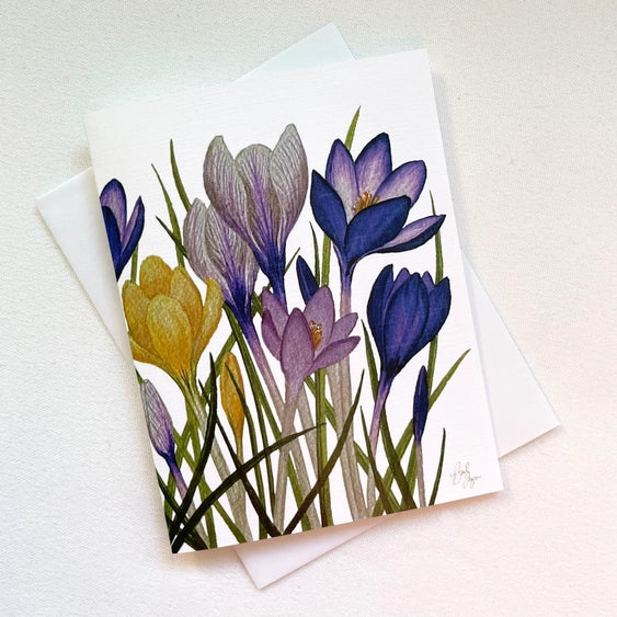 Bulb & Blossom Crocus Notecard features watercolor crocus blooms in shades of purple, violet, and gold printed on linen-textured cardstock, blank inside with envelope