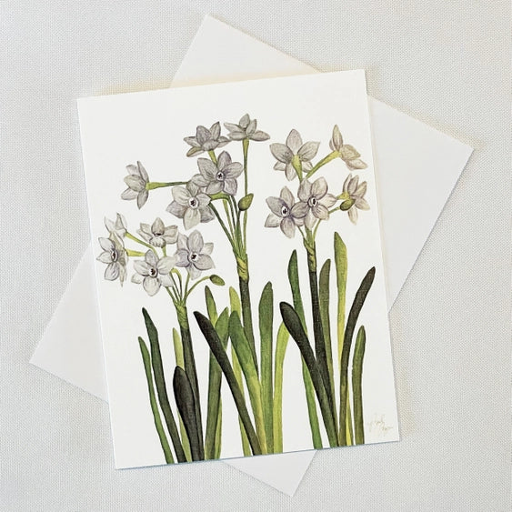 Bulb & Blossom's Paperwhite Notecard features a watercolor illustration of white narcissus flowers printed on linen-textured cardstock, blank inside with white envelope.