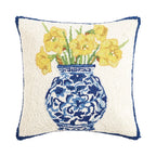 A woolen needle hook throw pillow featuring a chinoiserie vase holding daffodil flowers.
