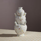 The Ditsy Floral Tulipiere Vase from Bulb & Blossom is a classic and impactful way to display blooming floral stems. Vessels stack on 3 different levels and have angled spouts to help create a perfect arrangement.