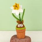 Our Felted Daffodil Blossom Buddy features a smiling felted daffodil bulb in full bloom.