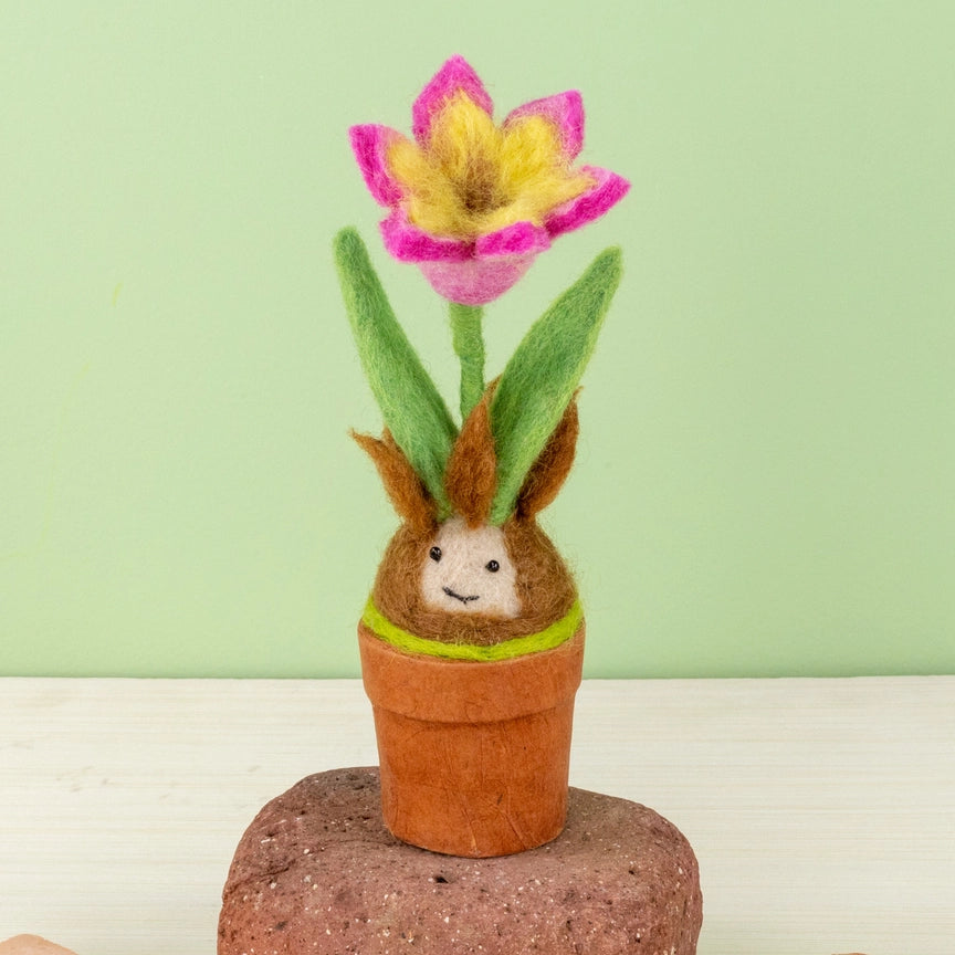 Our cheerful smiling hand felted tulip blossom buddy makes a great floral gift.