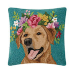 A square decorative throw pillow featuring a detailed, textured hook-and-loop style illustration of a yellow labrador dog wearing a colorful floral crown, set against a solid teal background.