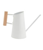 A white metal watering can with a long spout and a light natural wood handle, shown against a plain white background.