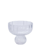A clear glass pedestal bowl with a fluted rim and a rounded base, shown on a plain white background.