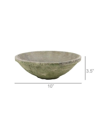 A rustic, handcrafted stone bowl with a textured, weathered finish in muted gray-green tones, isolated on a white background. dimensional measurements have been added to the images.