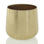 The Tulum Pot is a gold-colored, cylindrical metal cup featuring subtle engraved patterns, ideal as a stylish plant container and shown against a white background.