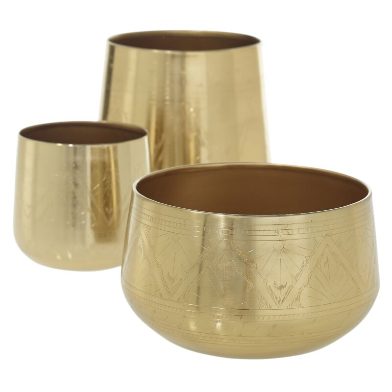The Tulum Pot set features three shiny gold metal plant containers in different sizes, each with a smooth reflective surface and subtle etched patterns, displayed together against a white background.