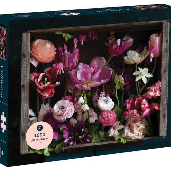 The Cultivated 1000 Piece Puzzle features a diorama of tulips and other spring blooming bulbs arranged within a wooden frame.
