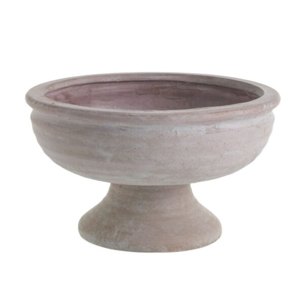 The Winnie ceramic compote from Bulb & Blossom is a shallow vessel perfect for bulb forcing or floral arrangements. Its neutral pink tone is an elegant backdrop to your blooms.